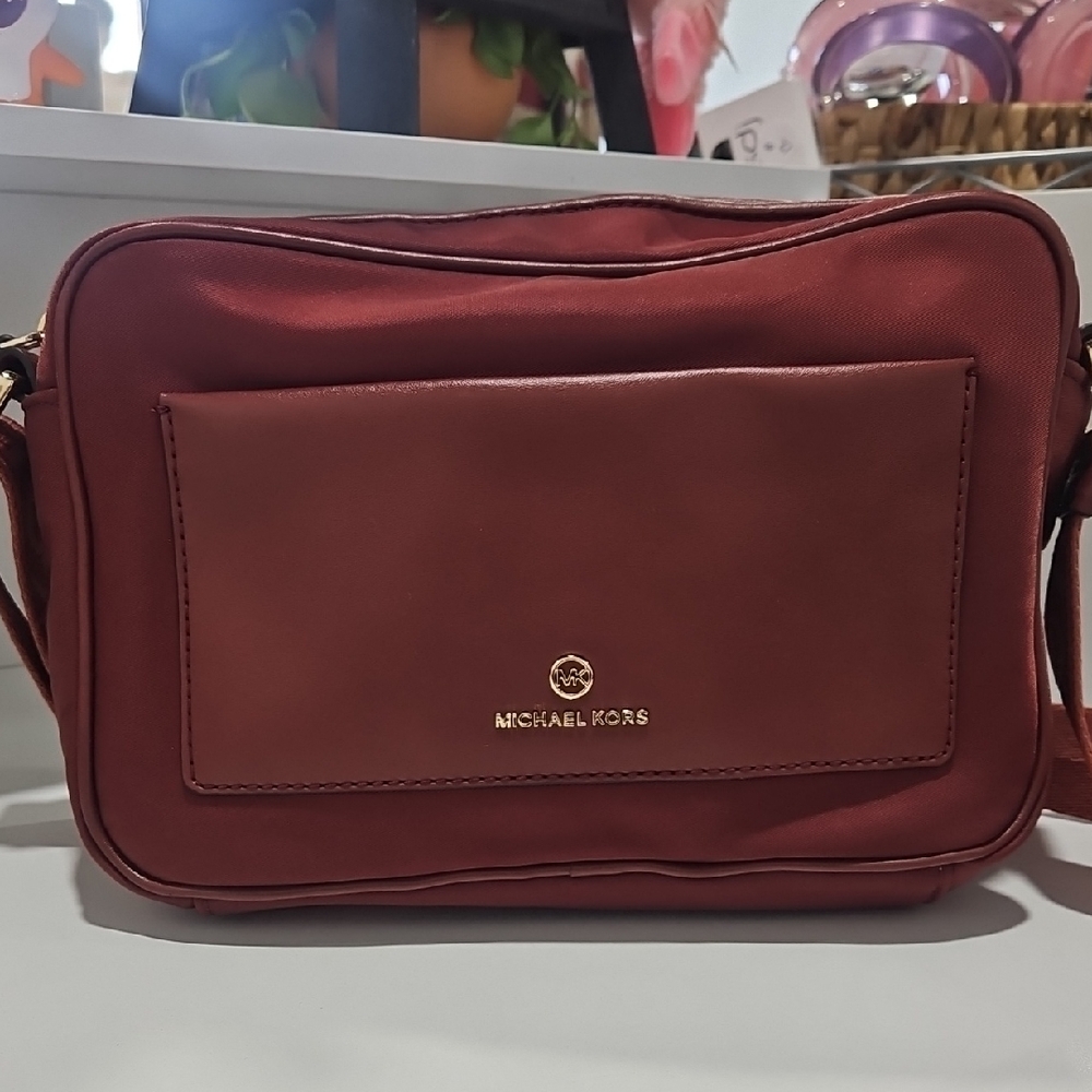 Michael Kors Burgundy Messenger Bag. In Perfect Condition.